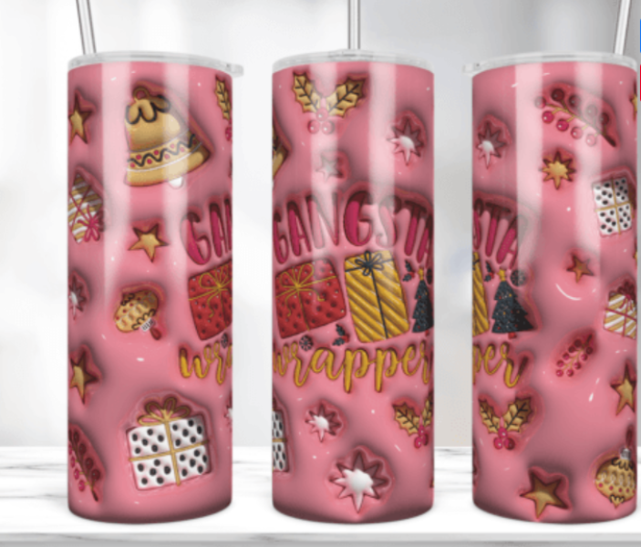 Christmas items presents with the words "Gangsta Wrapper" on a pink tumbler 20 oz