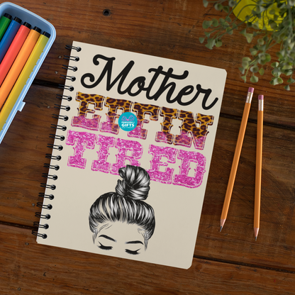 Wired  notebook with the words "Mother Effin Tired" and a drawing of a mom with a high bun.