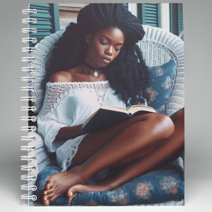 Wired  Notebook with a picture of a Black Woman in a wicker chair reading a book.