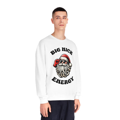 Slim male wearing a white Sweatshirt with  Santa Clause with Sunglasses on that reads "Big Nick Energy"
