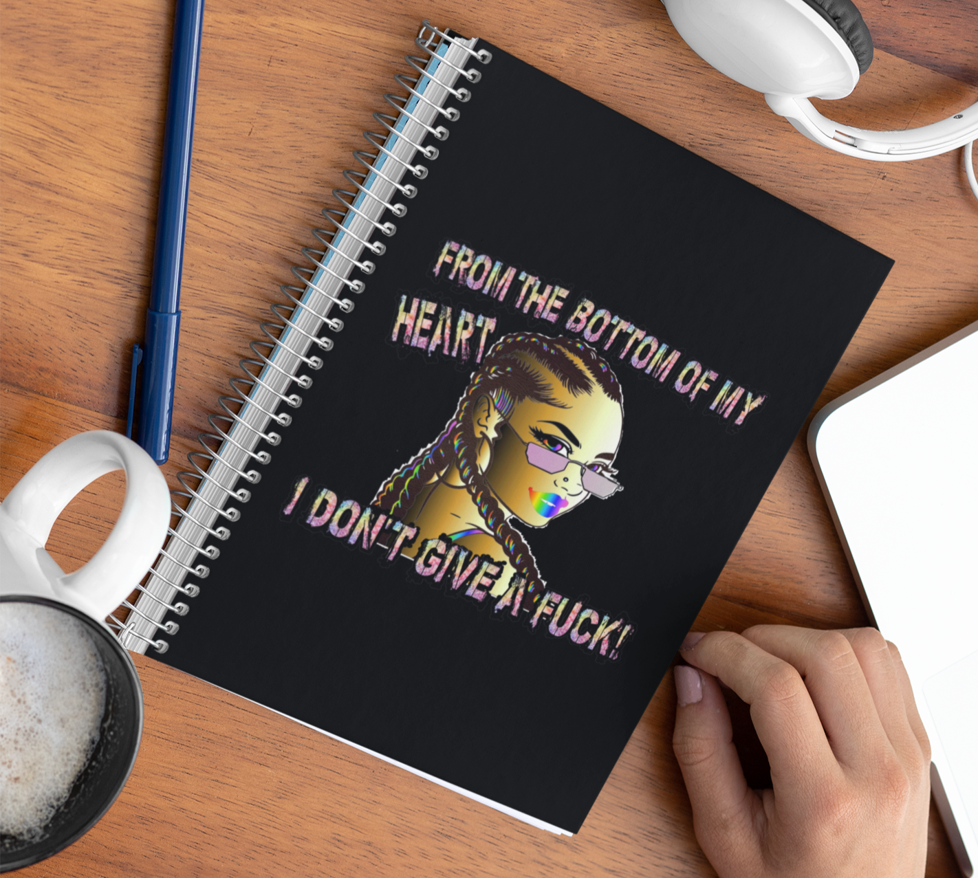 Black Spiral notebook with a Girl with cornrolls. The words "From the bottom of My Heart, I don't Give a Fuck!"
