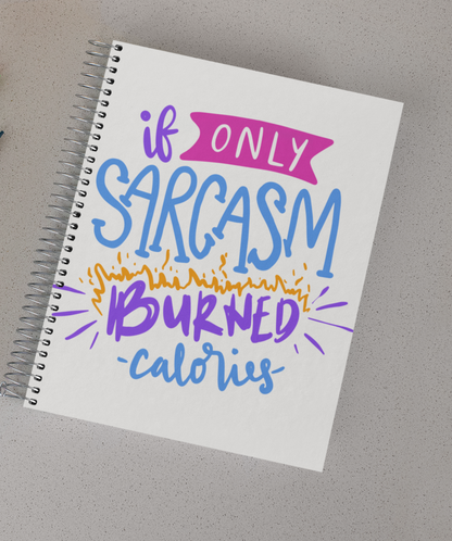 A White spiral notebook with the words "if only Sarcasm burned calories" on the front.