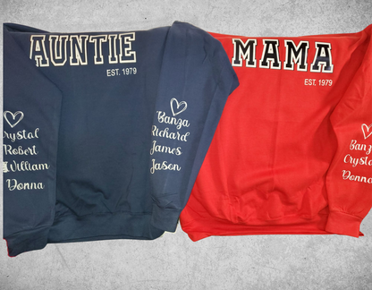 Two sweatshirts. A blue one that reads " Auntie est 1979" and a read one that read " Mama est 1979"