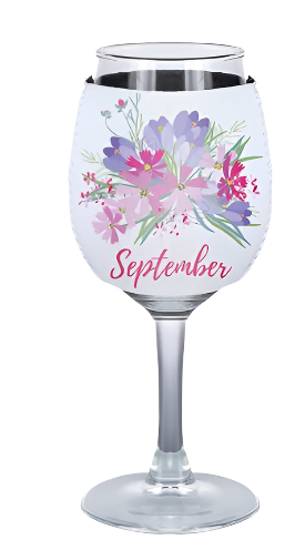 wine glass with white koozie with a floral decoration