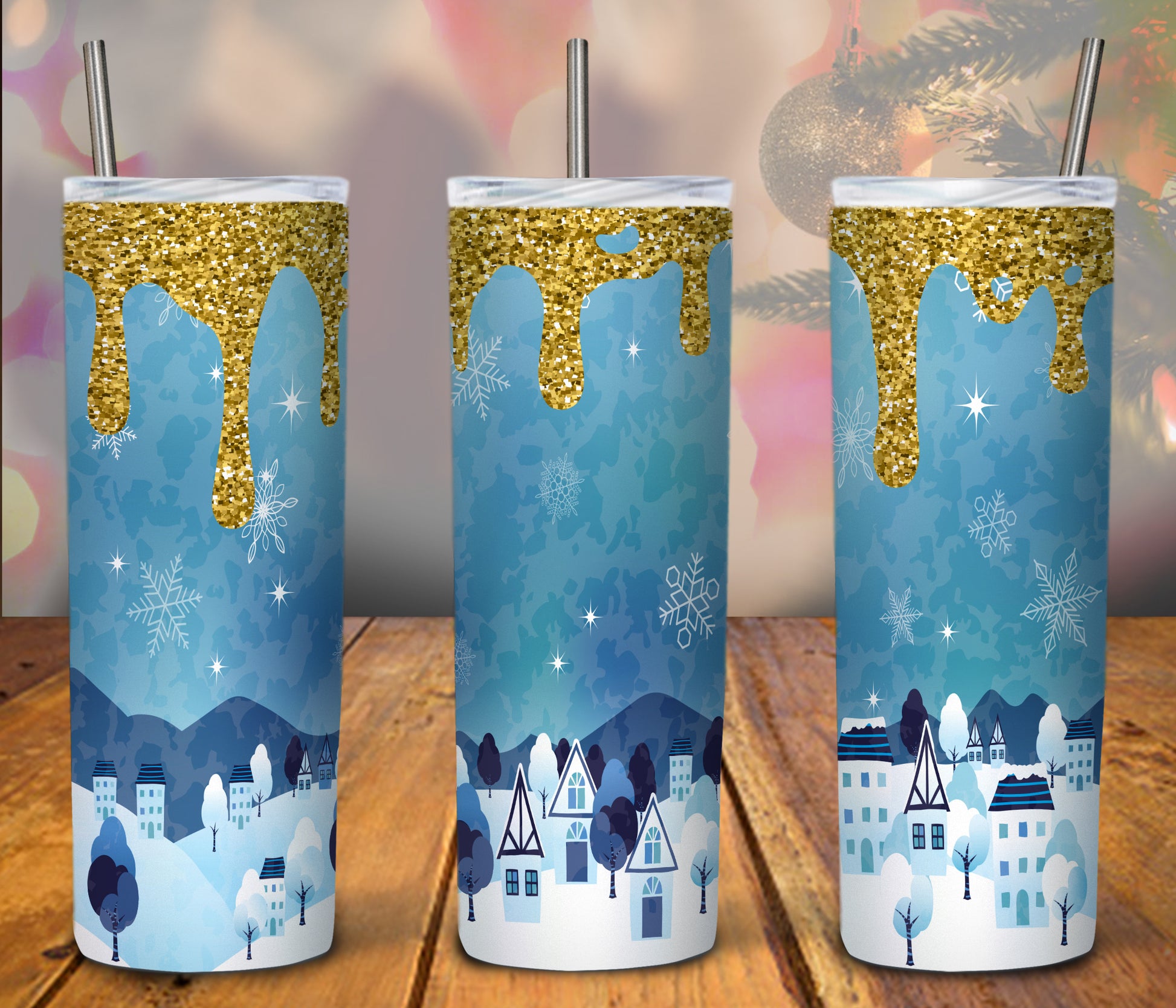 snowy town with gold glitter on a tumbler 20 oz