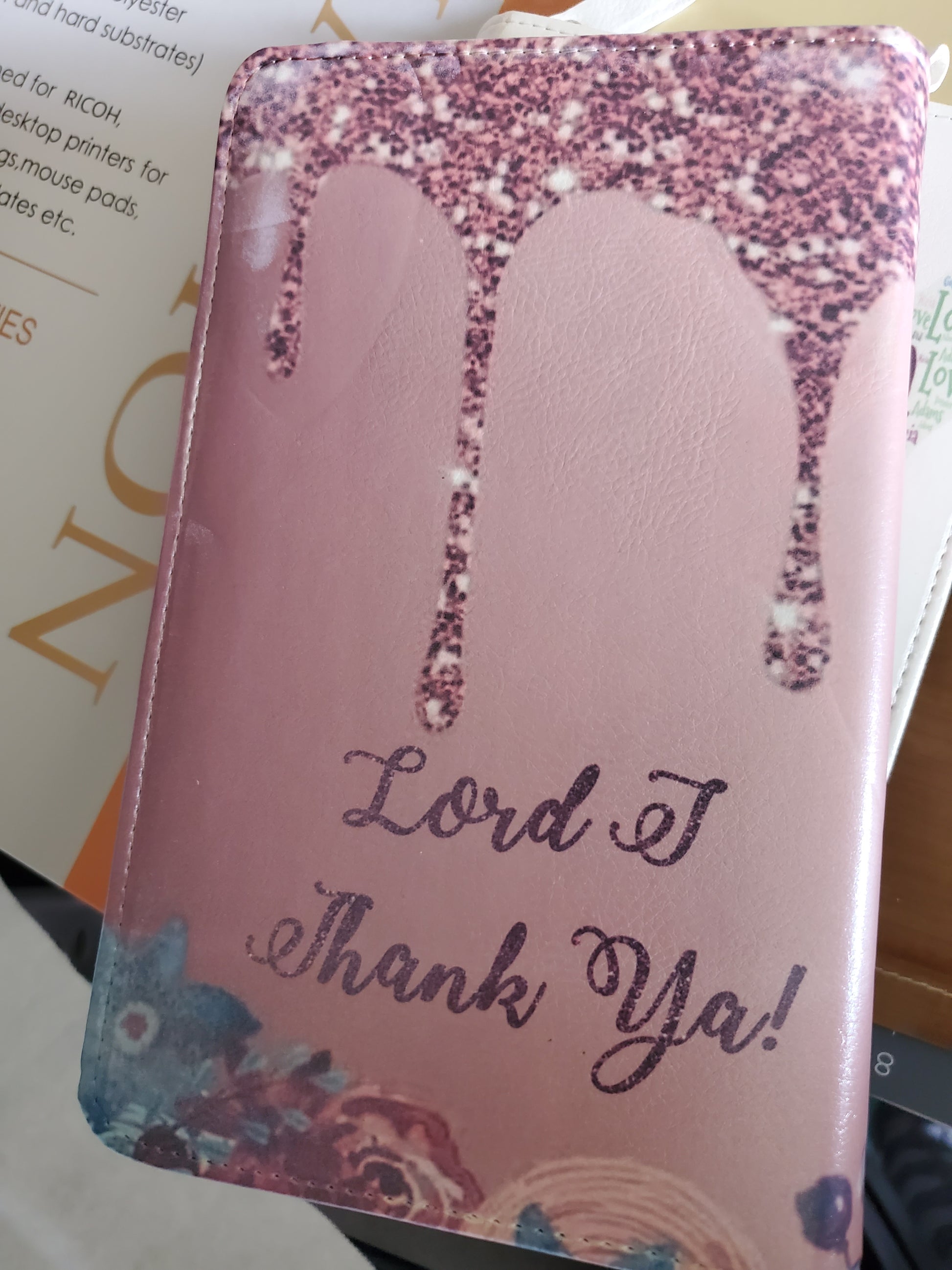 Pink Leatherette Journal with glitter print drip and the words "Lord, I thank ya" at the bottom.