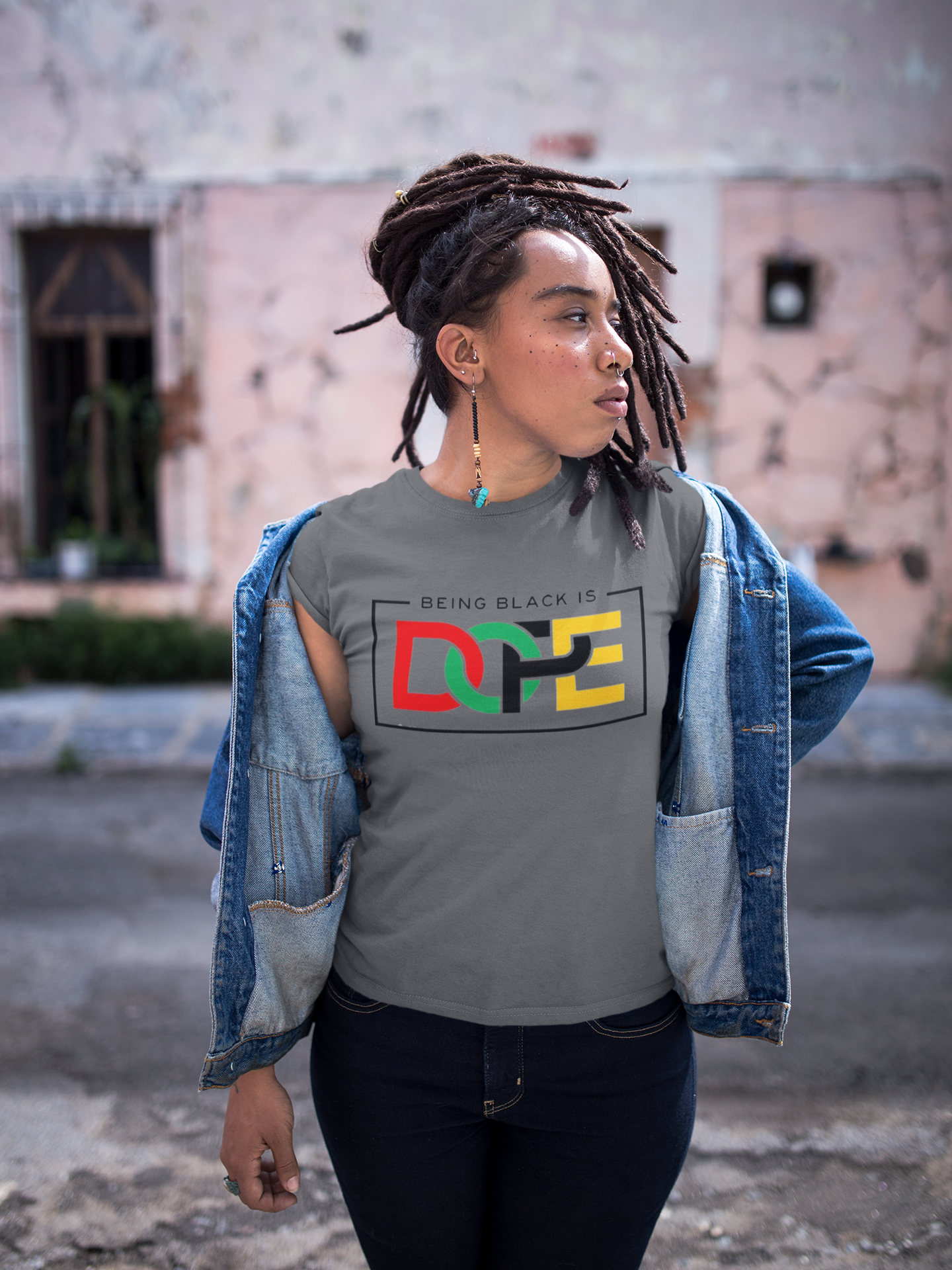 Black Girl with grey T shirt text "Being Black is Dope"