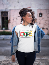 Load image into Gallery viewer, Black Girl with White T shirt text &quot;Being Black is Dope&quot;