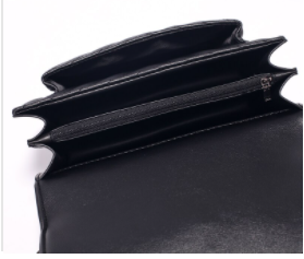 Interior of Black SL purse from Pandora J Gifts. Zipper pocket