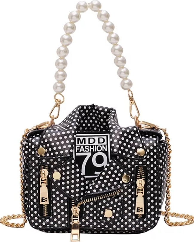 Leather Jacket style purse black with white polka dots. Pearl chain handle