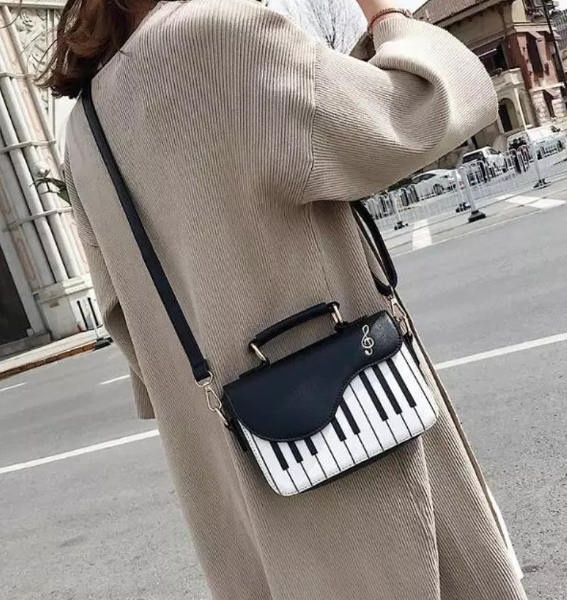Piano style purse