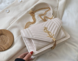 White quilt pattern purse with SL in Gold metal letters
