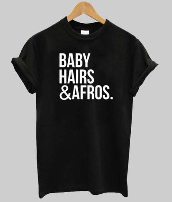 Black short sleeve T shirt with the words "Baby Hairs and Afros." in white letters
