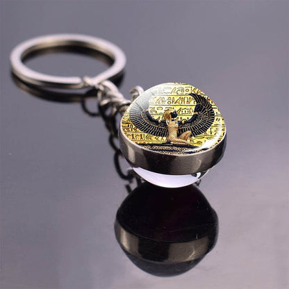 Glass ball keychain with Egyptian art.