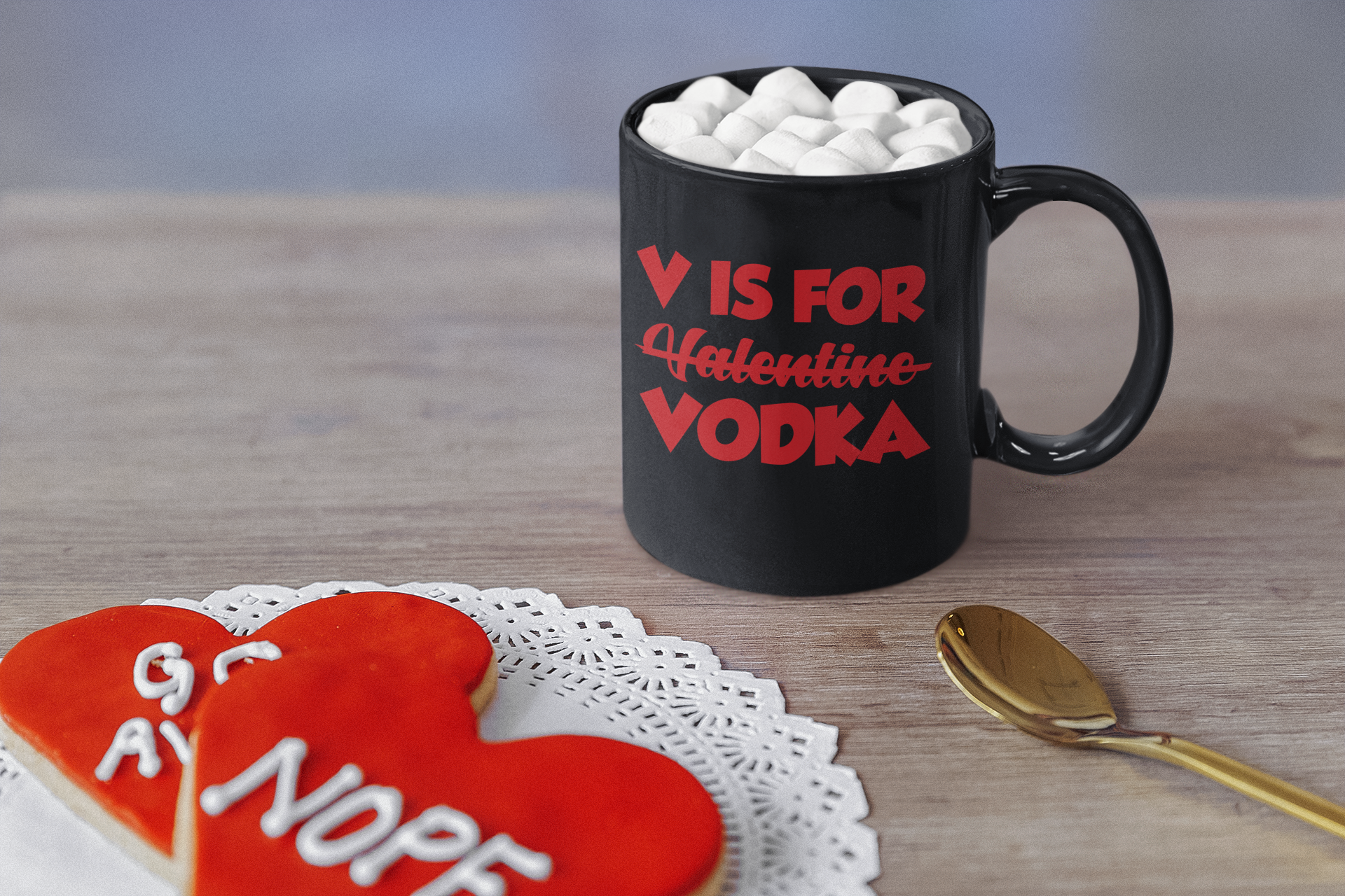 Black mug with red letters "V is for vodka" instead of Valentine